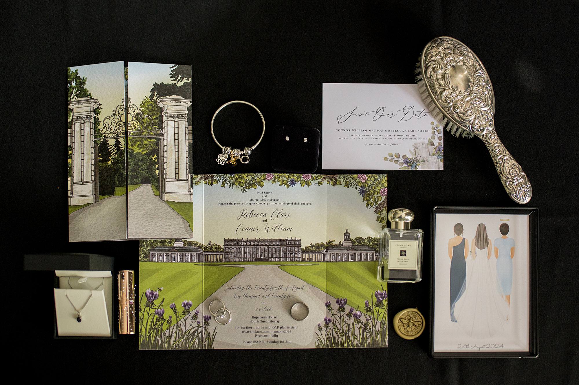 Flat lay display showing brides invite & jewellery